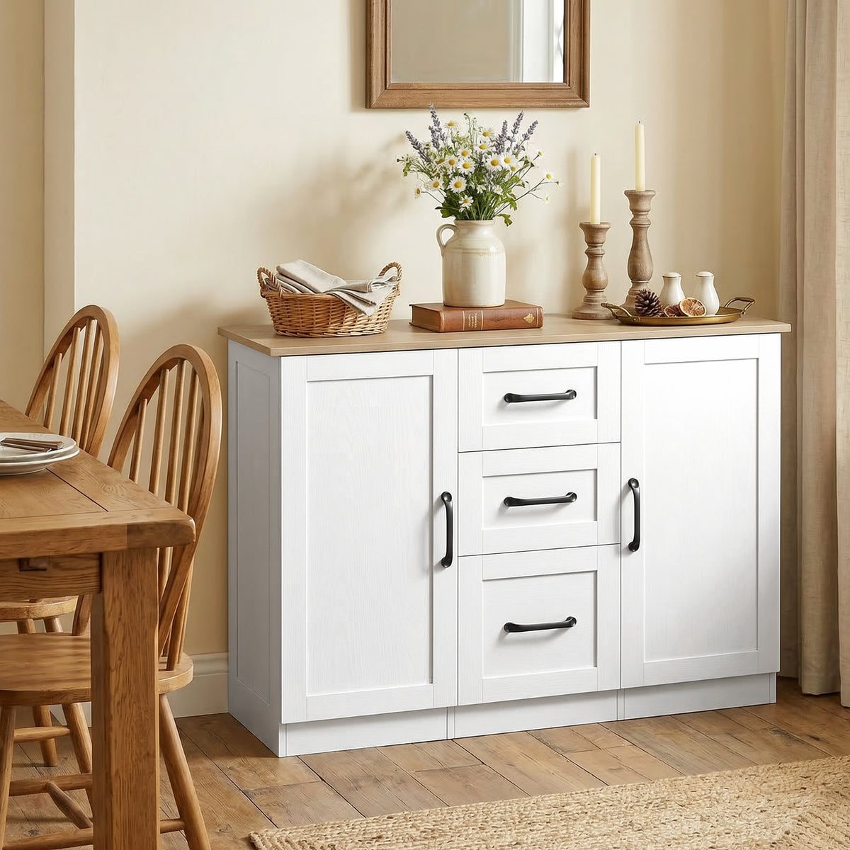 White sideboard cabinet with 3 drawers and 2 doors, black pulls, open front view