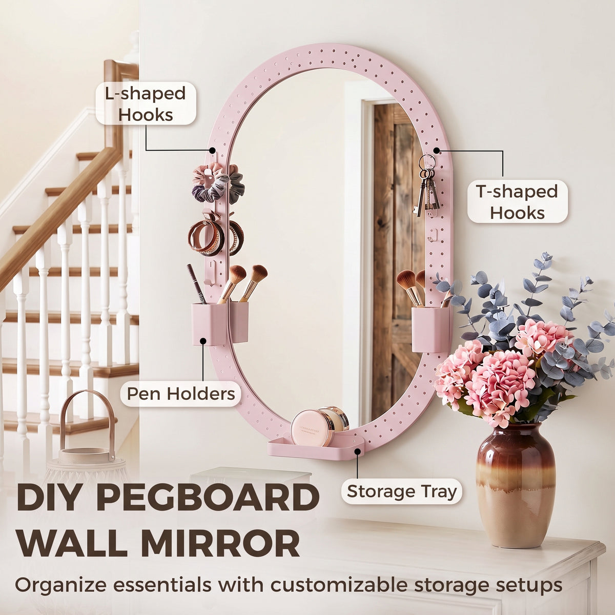 DIY pegboard wall mirror with pink oval frame, L- and T-shaped hooks, storage tray