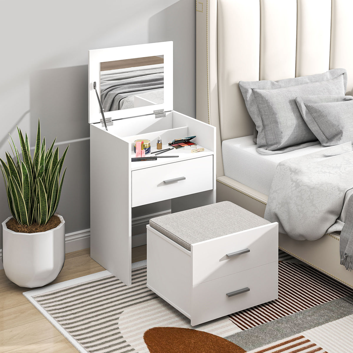 White vanity desk with open flip-up mirror, two drawers, and cushioned stool.