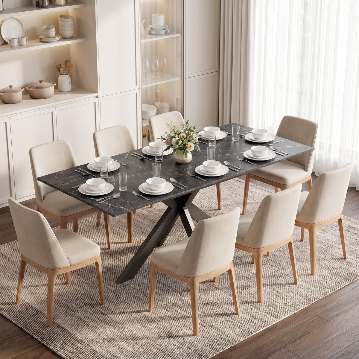 Extendable black marble-finish dining table with four chairs and center leaf