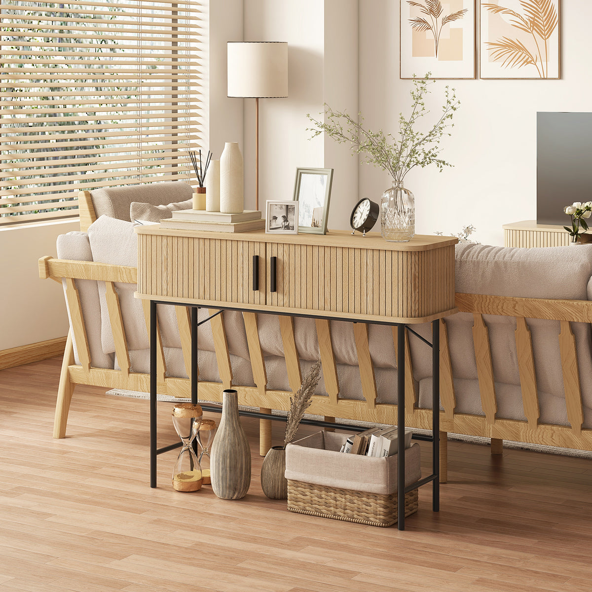 Light wood console table with two sliding slatted doors and black metal frame