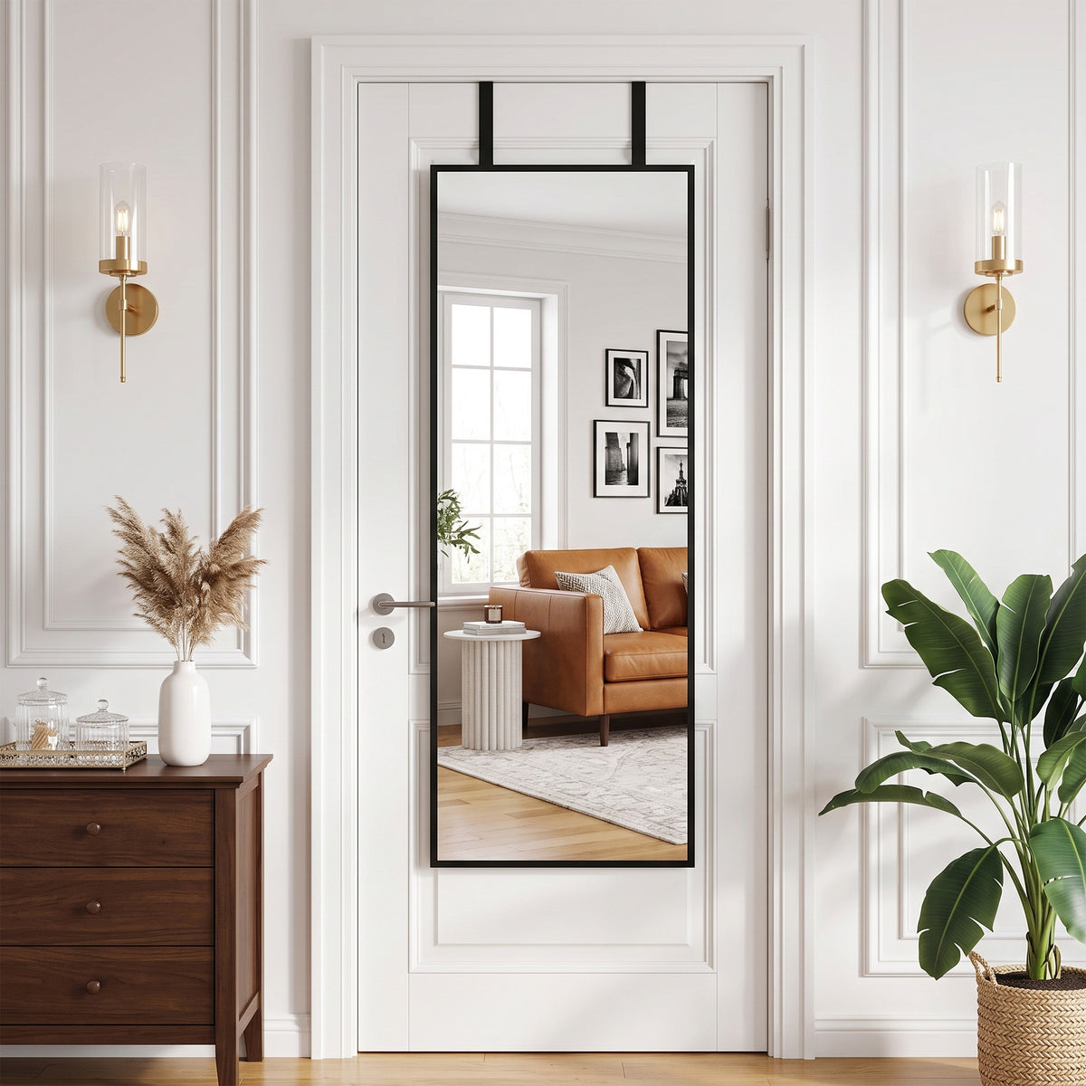Black-framed wall mirror showing room view through reflective glass