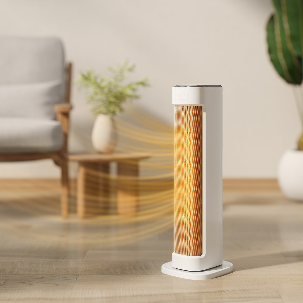 White ceramic tower heater with glowing heating element in front of a chair and plant