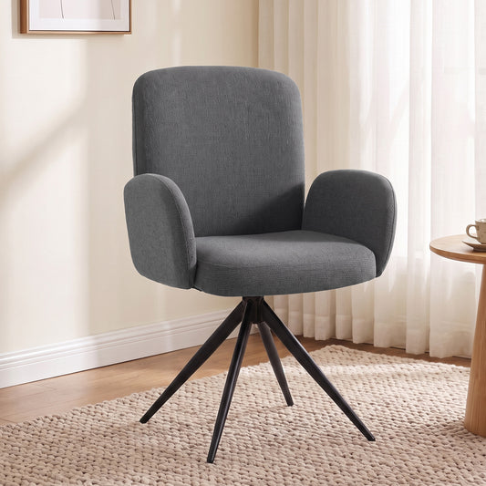 Grey swivel accent armchair with rounded back, padded armrests, and black tripod legs
