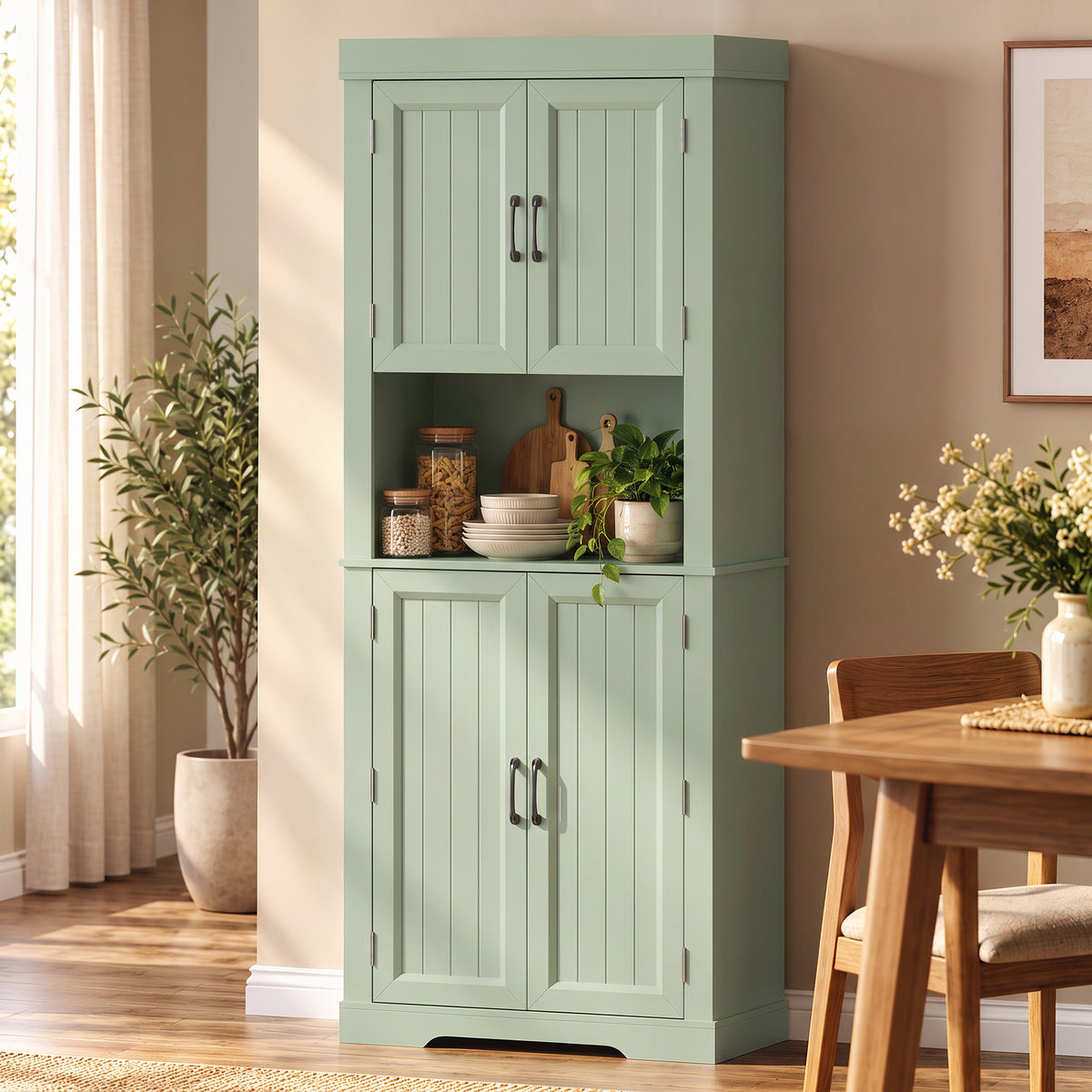 Sage green tall kitchen cabinet with paneled doors and open shelf display
