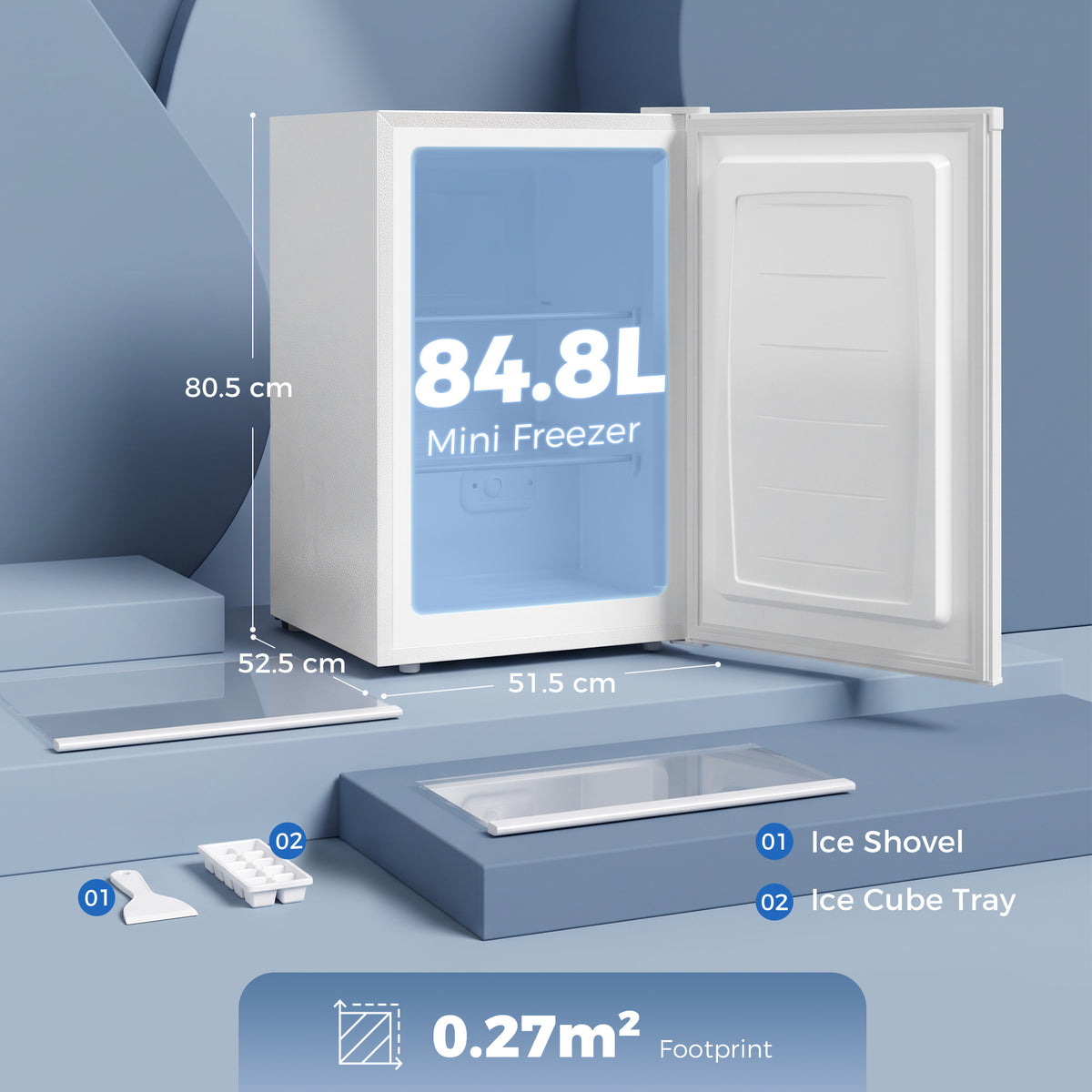 White countertop mini freezer with open door, ice shovel and ice cube tray