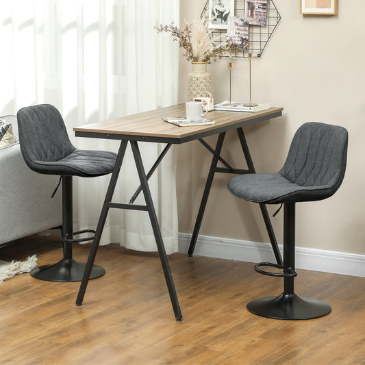 Set of two charcoal grey upholstered bar stools with swivel bases and footrests