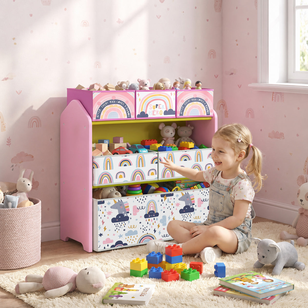 Pink 3-tier toy storage rack with fabric bins, rainbow-pattern fronts, child playing