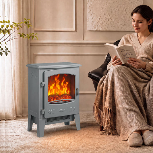 Grey freestanding electric fireplace with glass front showing realistic flames
