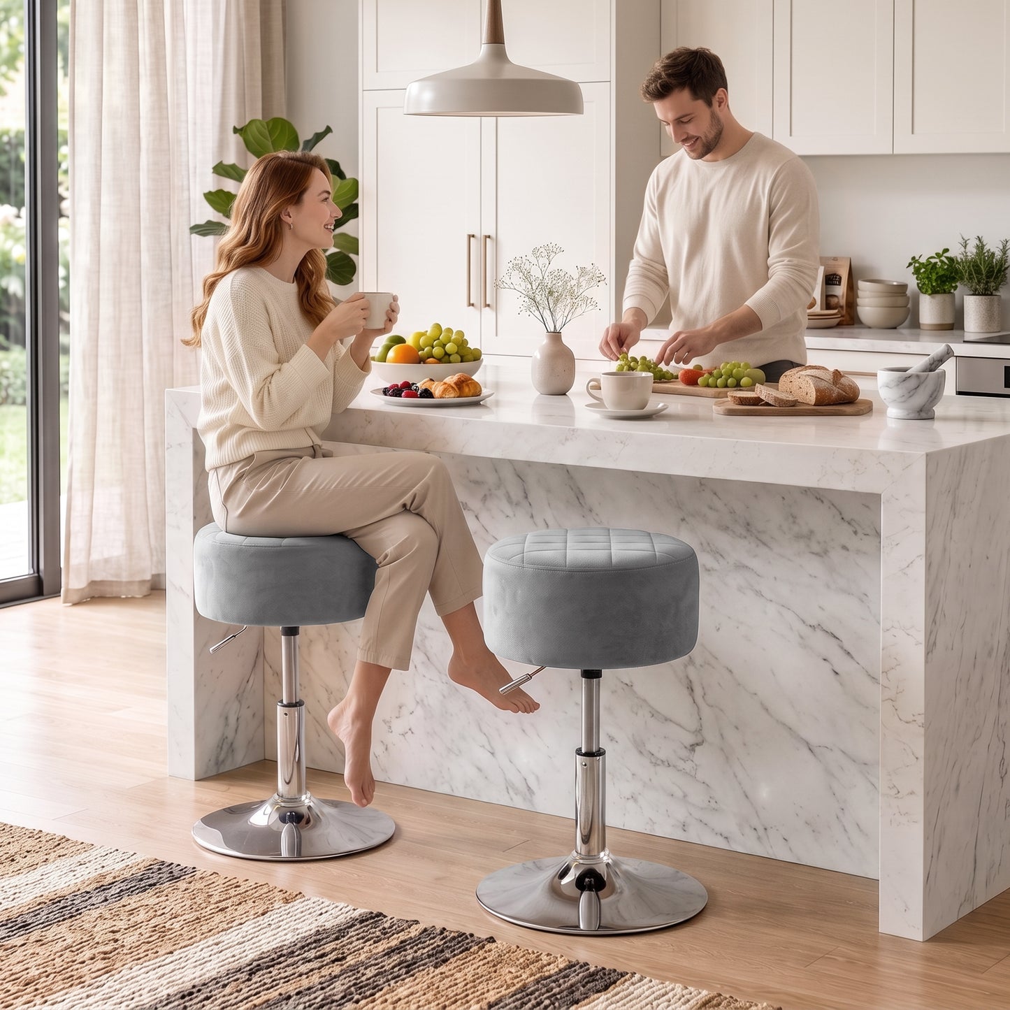 Grey swivel bar stool with soft velvet-look round seat and chrome pedestal base