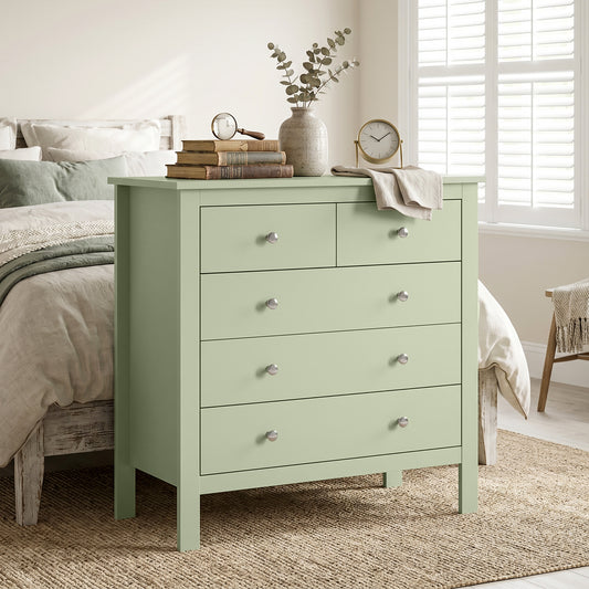 Sage green 5-drawer dresser with round metal knobs and sturdy raised legs