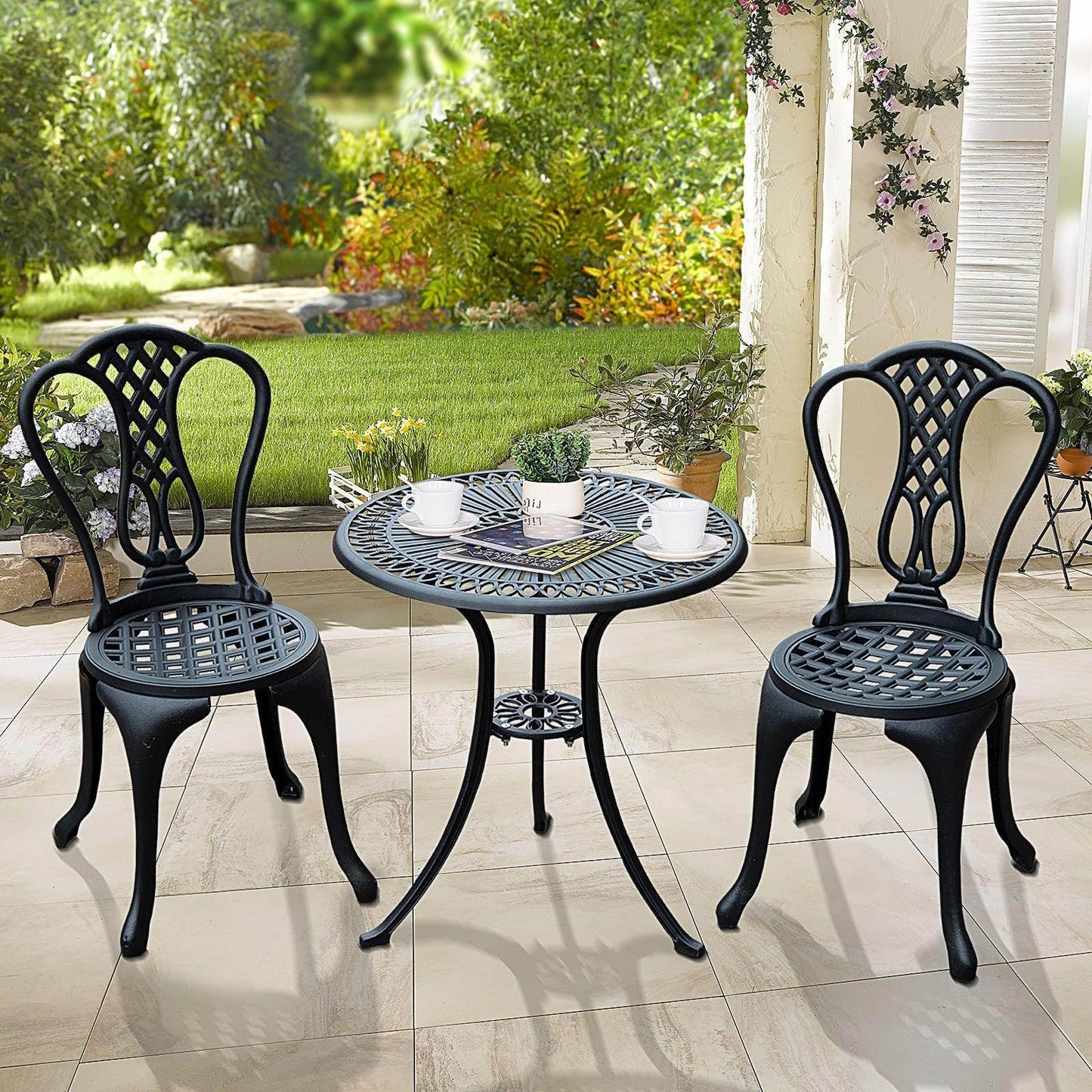 HOMCOM 3-piece patio bistro set with two black chairs and round table in a garden setting
