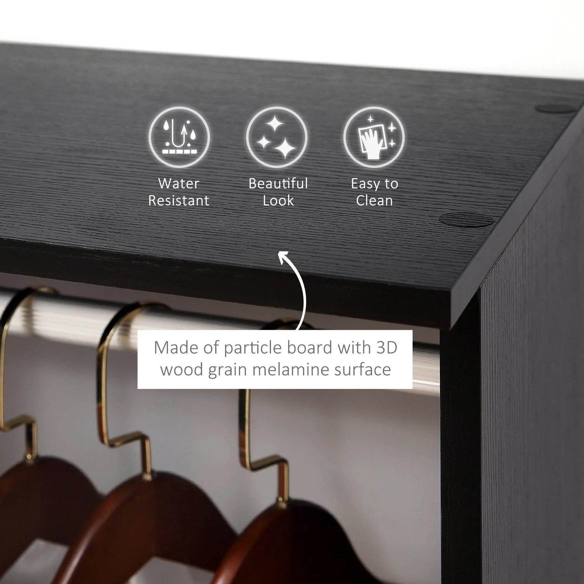 Close-up of black particle board wardrobe with 3D wood grain melamine surface and hanging clothes rails