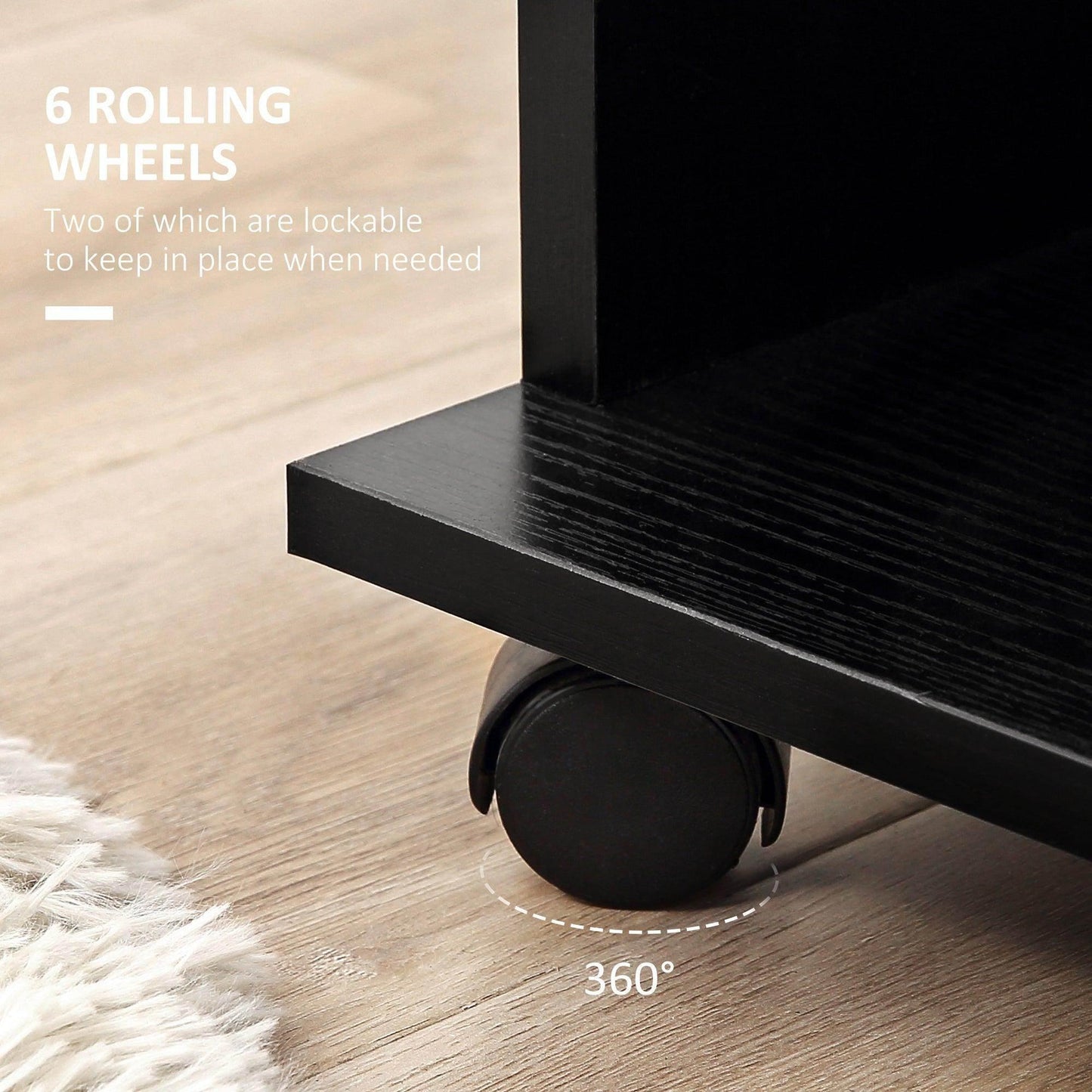 Close-up of black wardrobe bottom corner with lockable rolling wheel on wooden floor