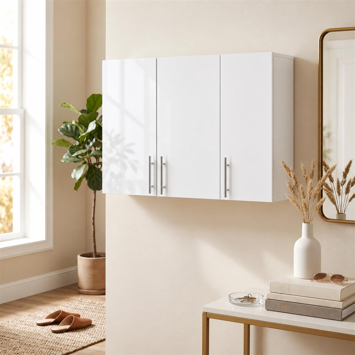 White bathroom wall cabinet with three hinged doors and metal bar handles