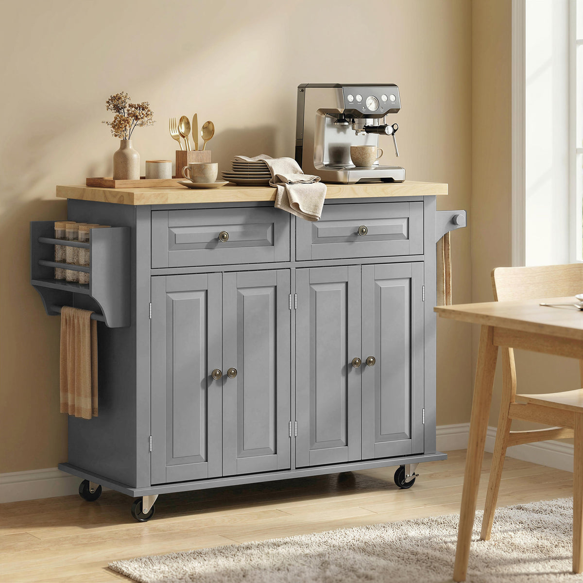 Rolling kitchen island with gray cabinet doors and drawers, rubberwood worktop on wheels