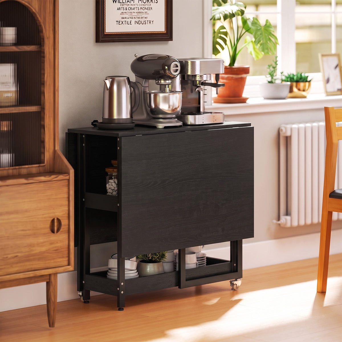 Black drop-leaf dining table with side storage cabinet and metal frame