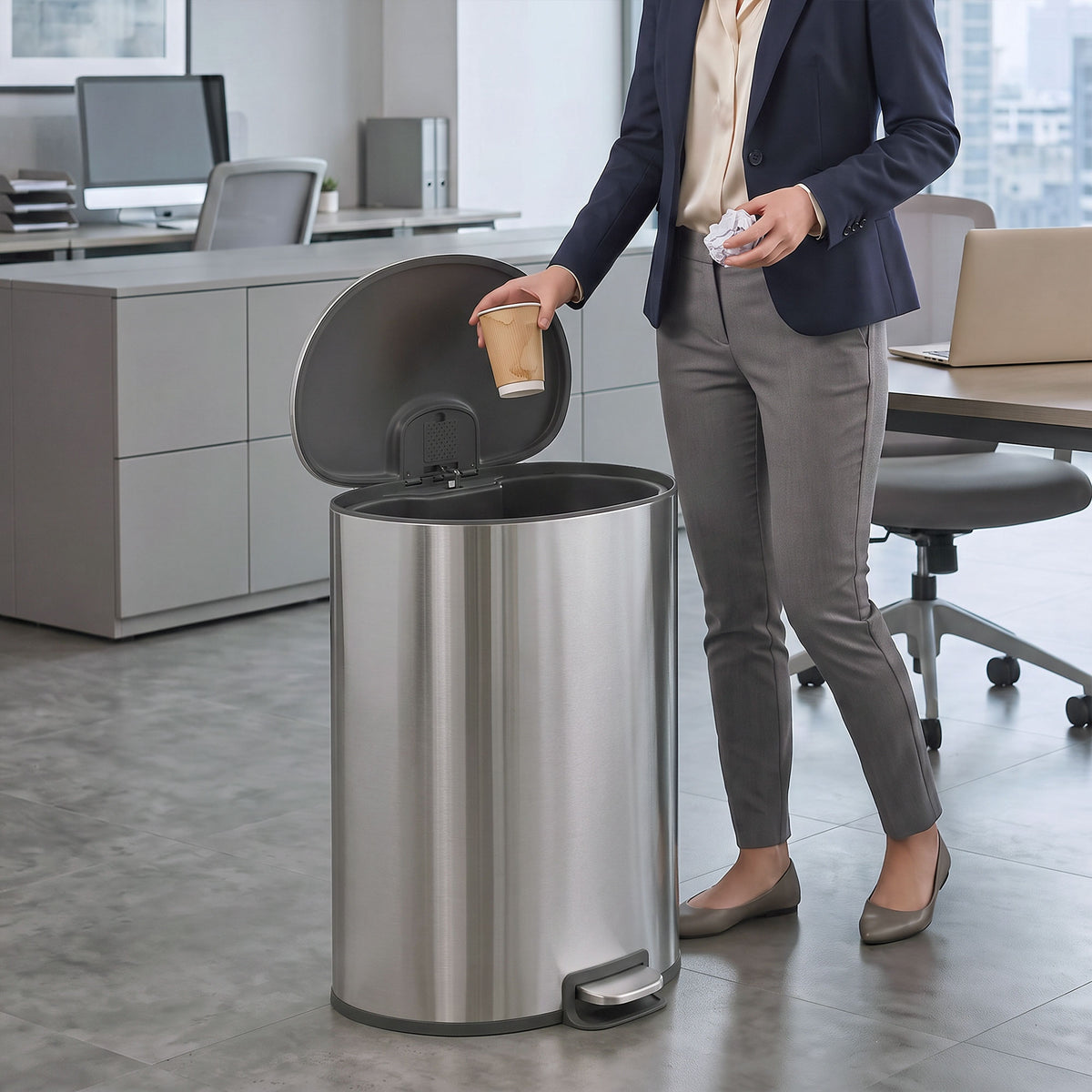 Stainless steel kitchen pedal bin with lid open and foot pedal at the base