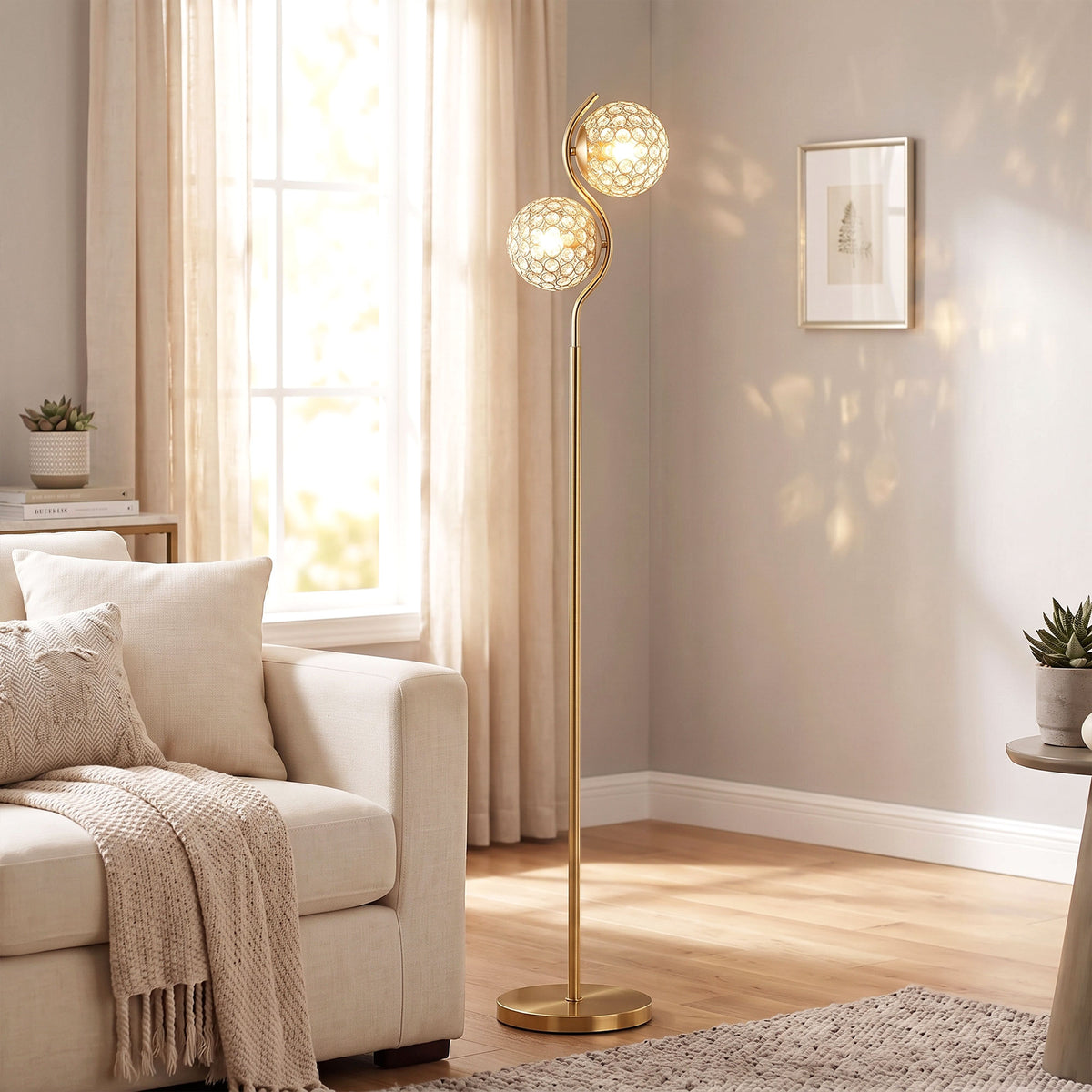 Dual head floor lamp with gold stand, two crystal globe shades, and round base