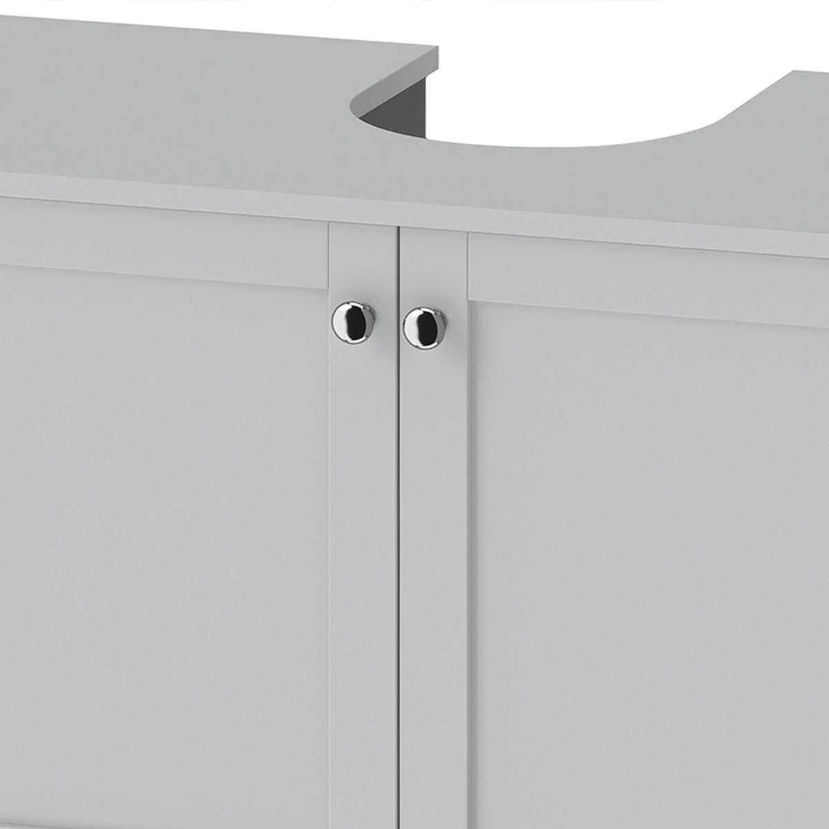 Light blue cabinet doors with two round silver knobs and U-shaped counter cutout