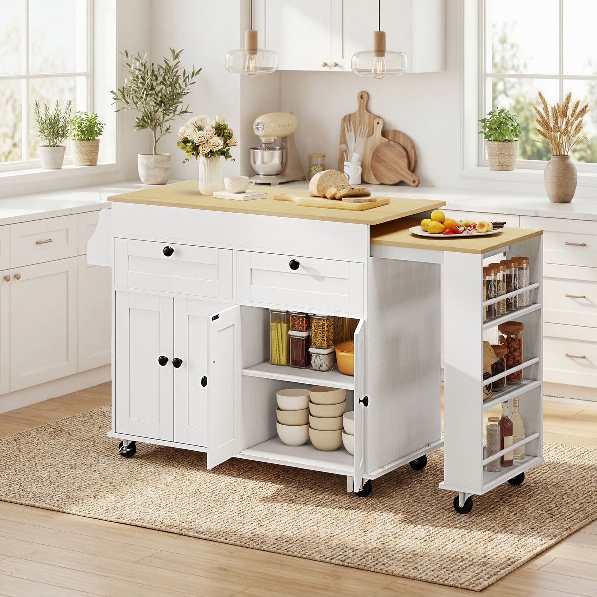 Rolling kitchen island with open side pantry shelves and drawers, white doors, caster wheels.