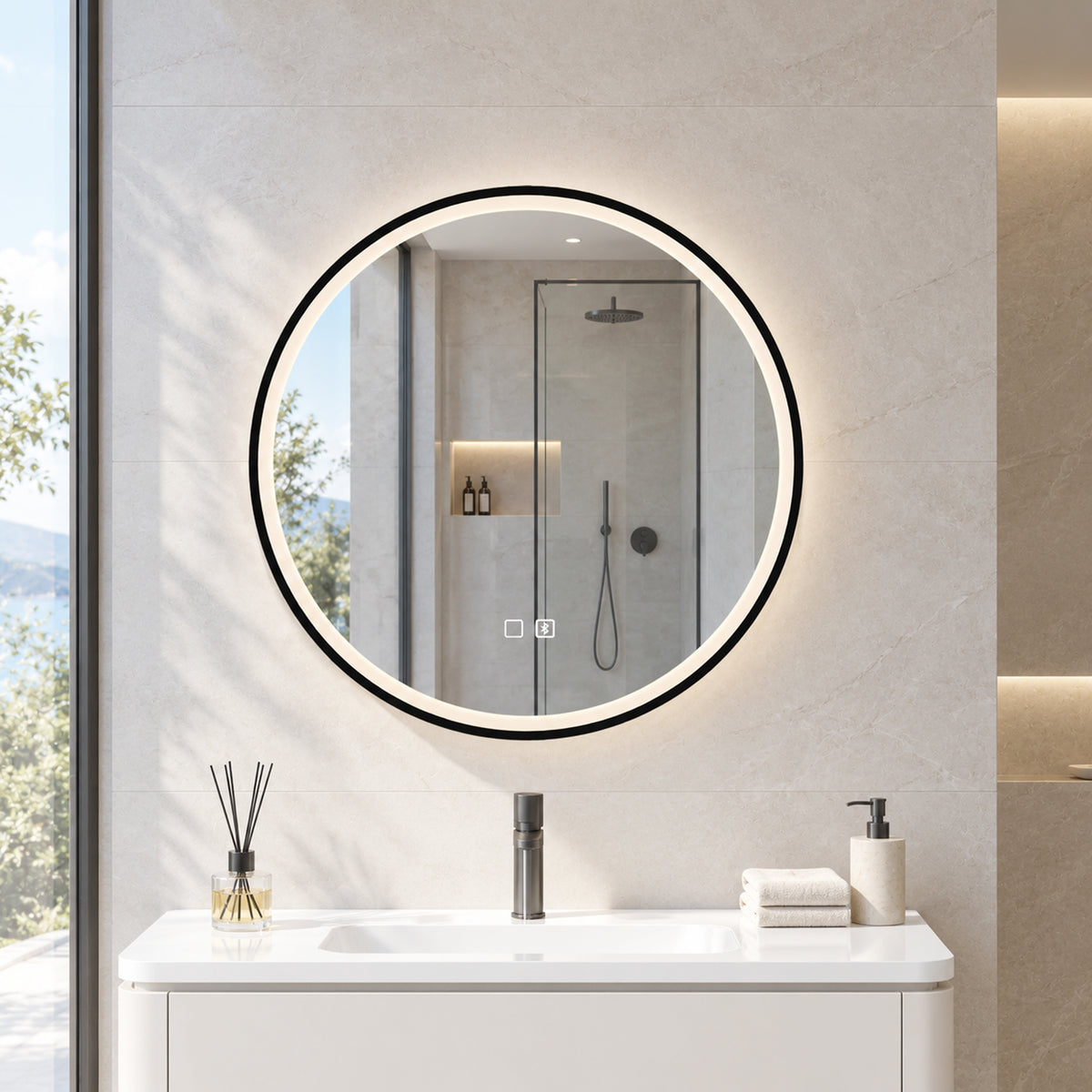 Round LED bathroom mirror over white vanity with glowing perimeter light ring
