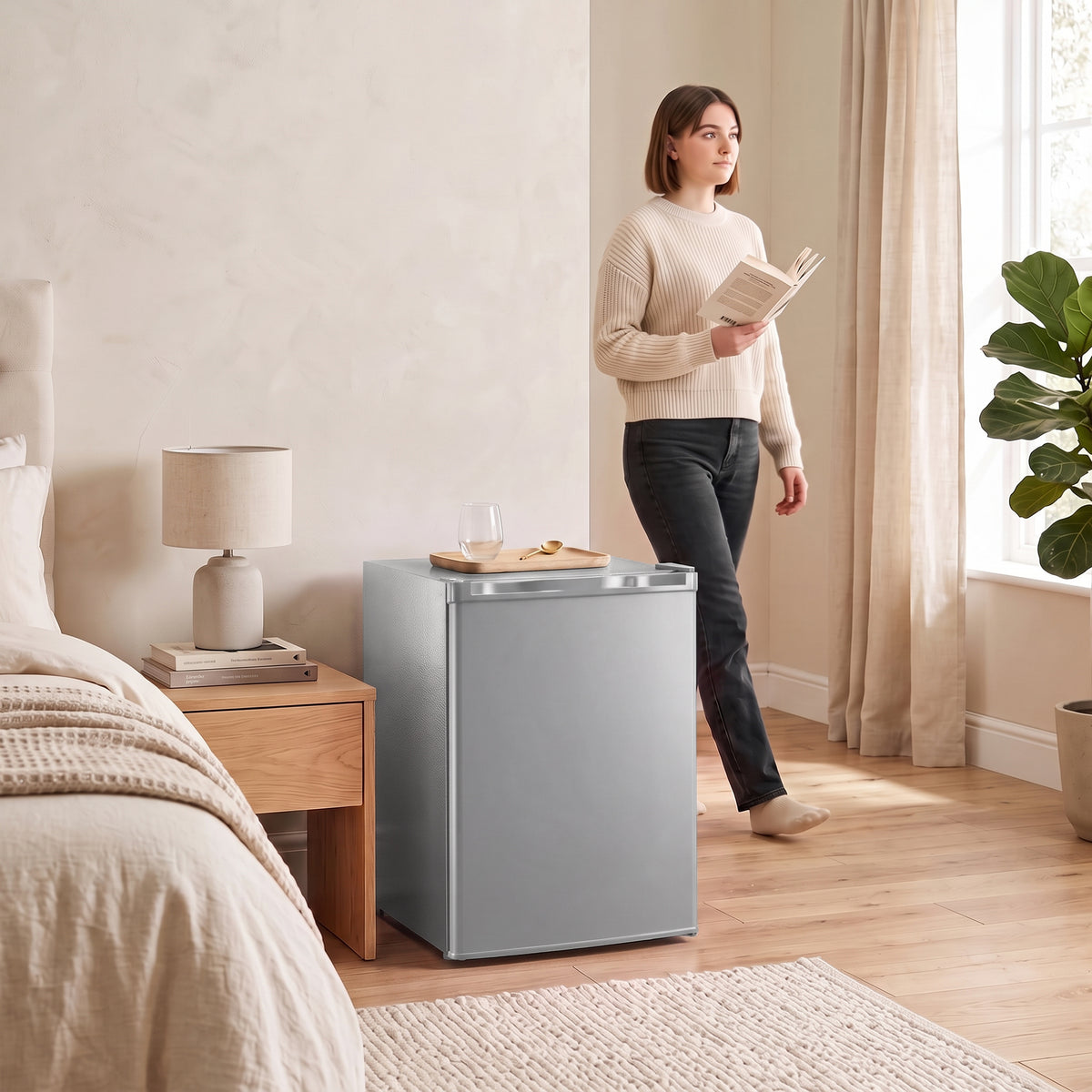 Grey mini fridge with chiller box, standing upright with closed door