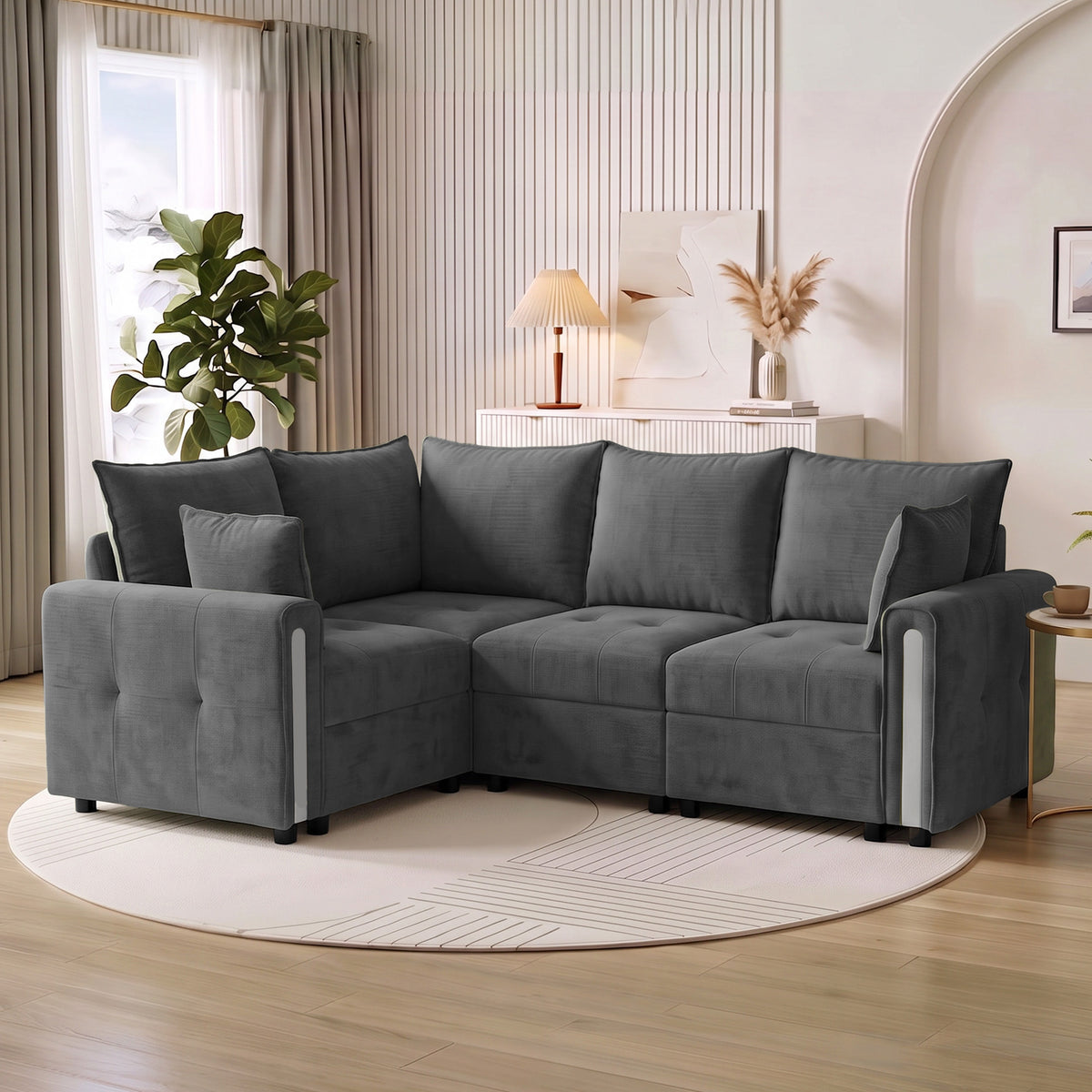 Dark grey L-shaped sectional sofa with wide chaise side and plush seat cushions