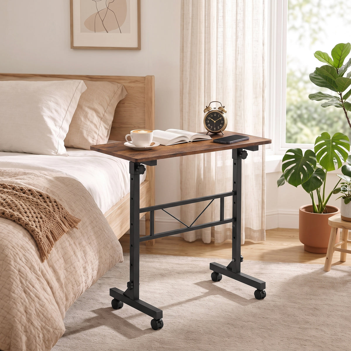 Adjustable overbed table beside bed with dark wood top and black mobile base