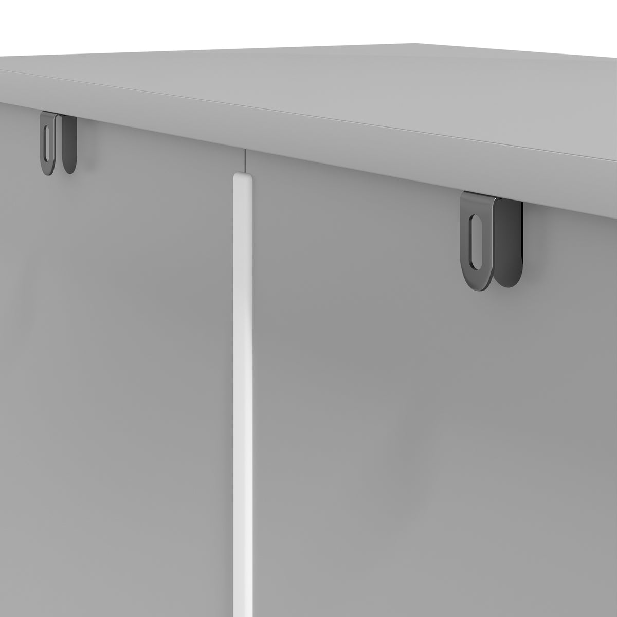 Grey anti-tip strap mount hardware on cabinet top edge