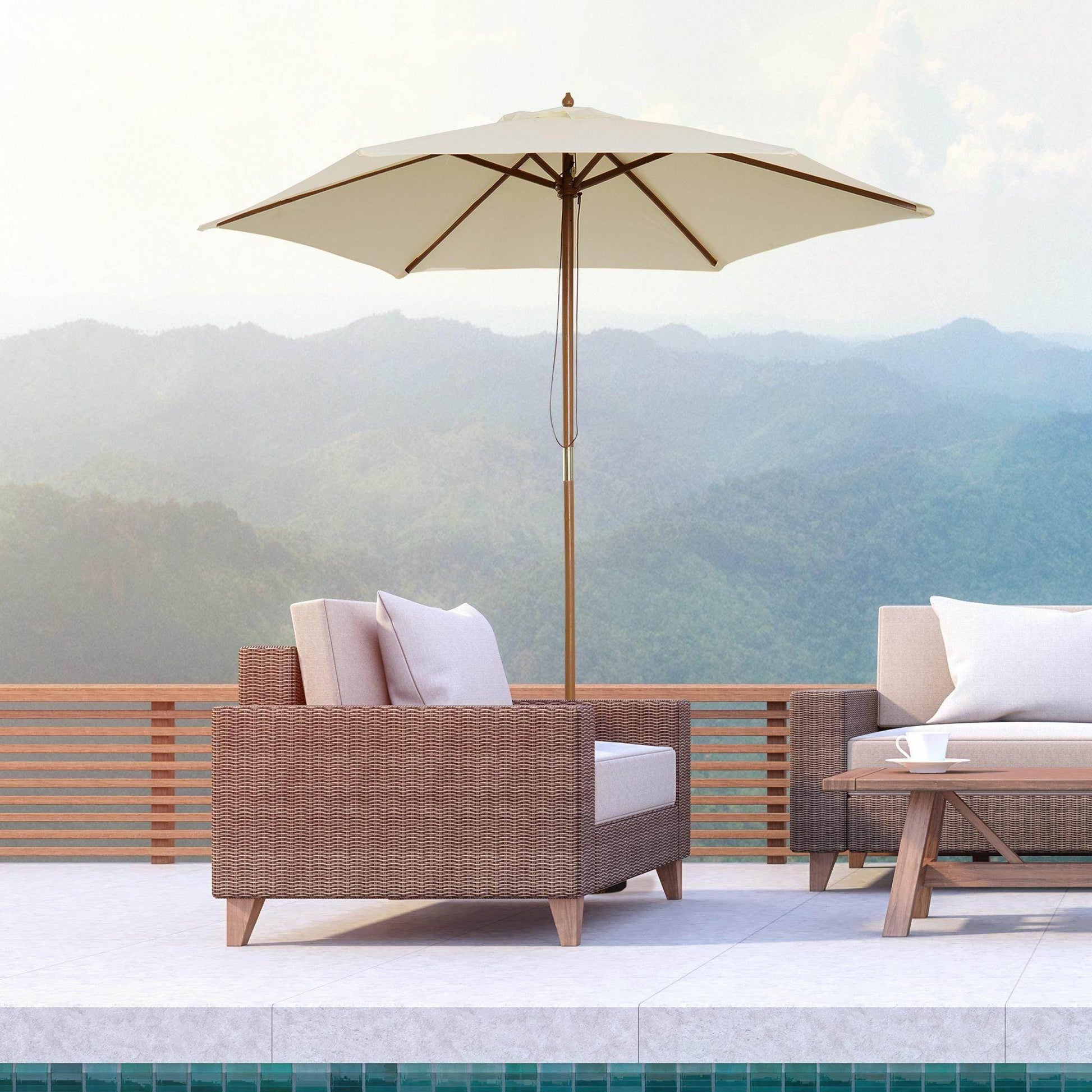 Beige wooden garden parasol with rattan outdoor furniture by a pool, mountain view terrace
