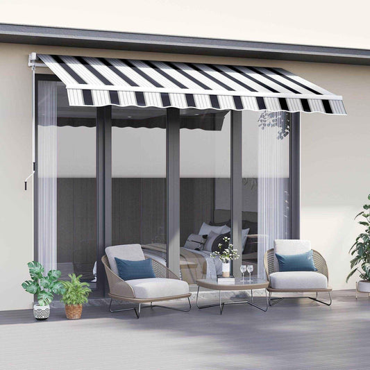 Blue and white striped manual awning with winding handle shading modern patio seating area