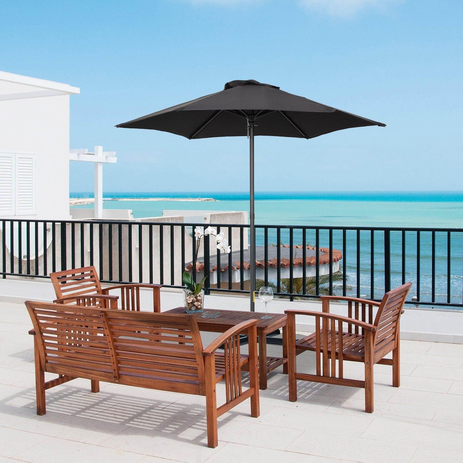 Outsunny patio umbrella with dark canopy open on a central pole and ribs