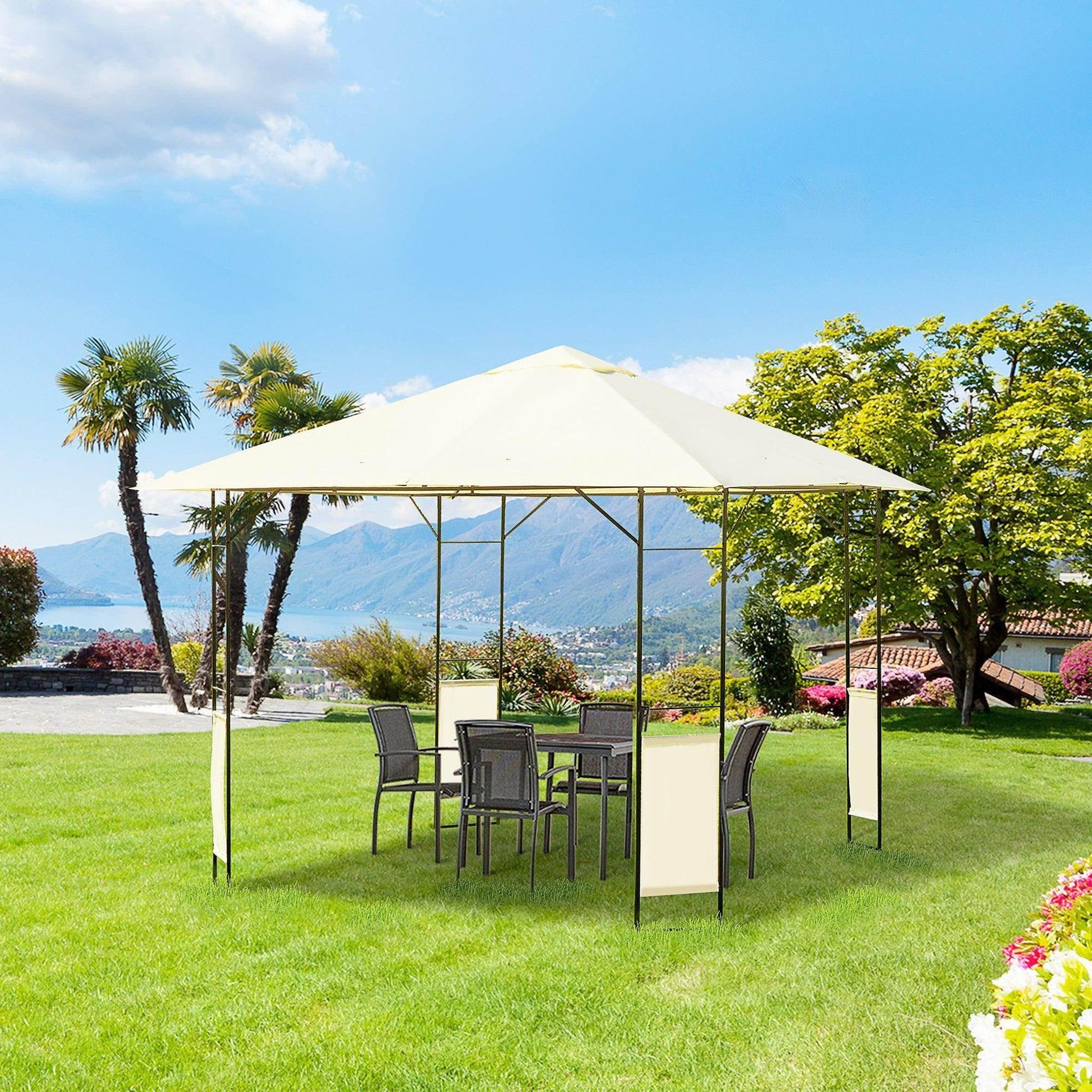 Cream metal garden gazebo with table and chairs set on green lawn under blue sky