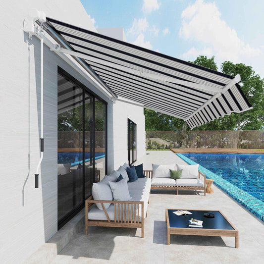 Outdoor patio with retractable blue and white striped awning, cushioned wooden sofas, and poolside setting