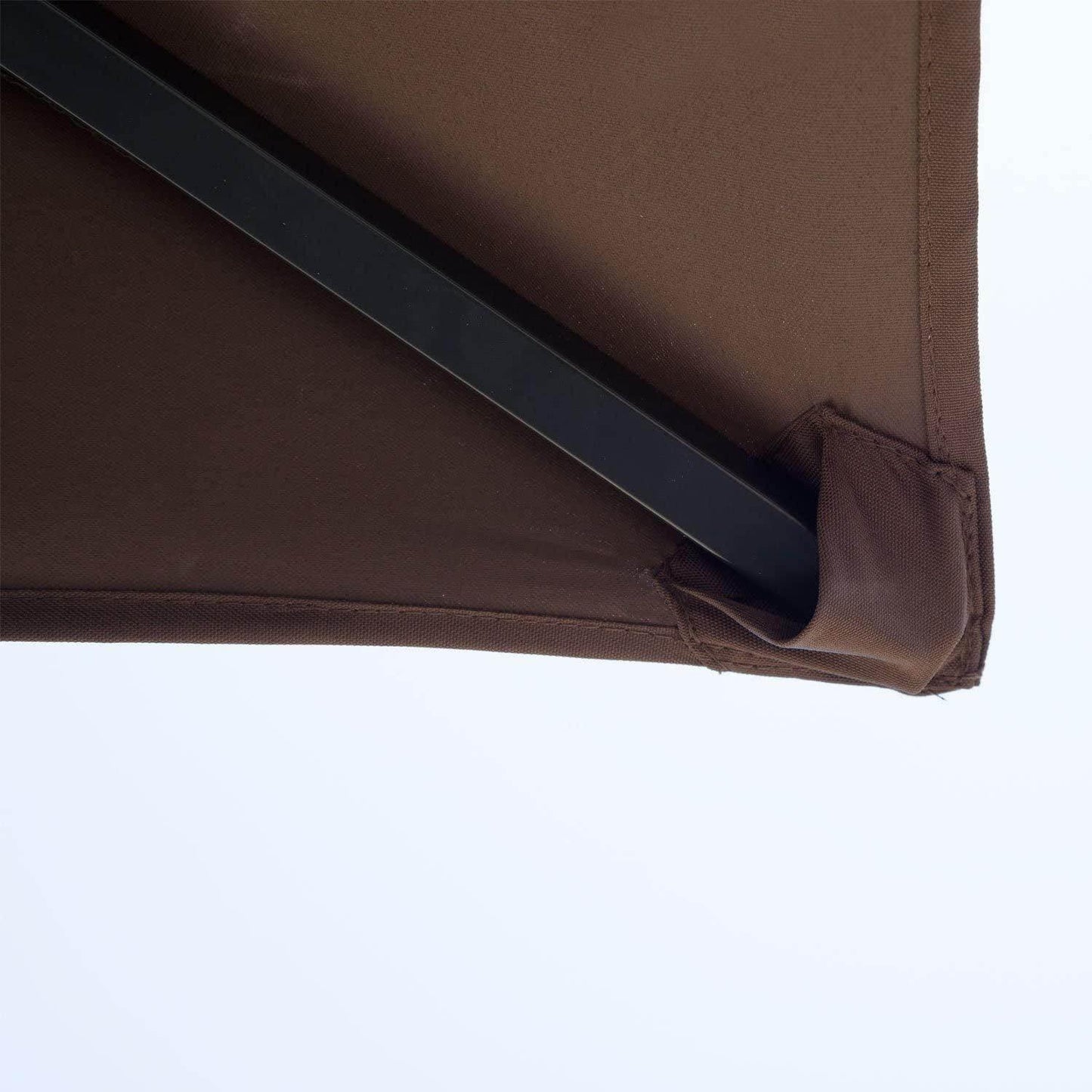 Close-up of brown fabric corner and black metal frame of Outsunny 8ft double-tier BBQ gazebo shelter