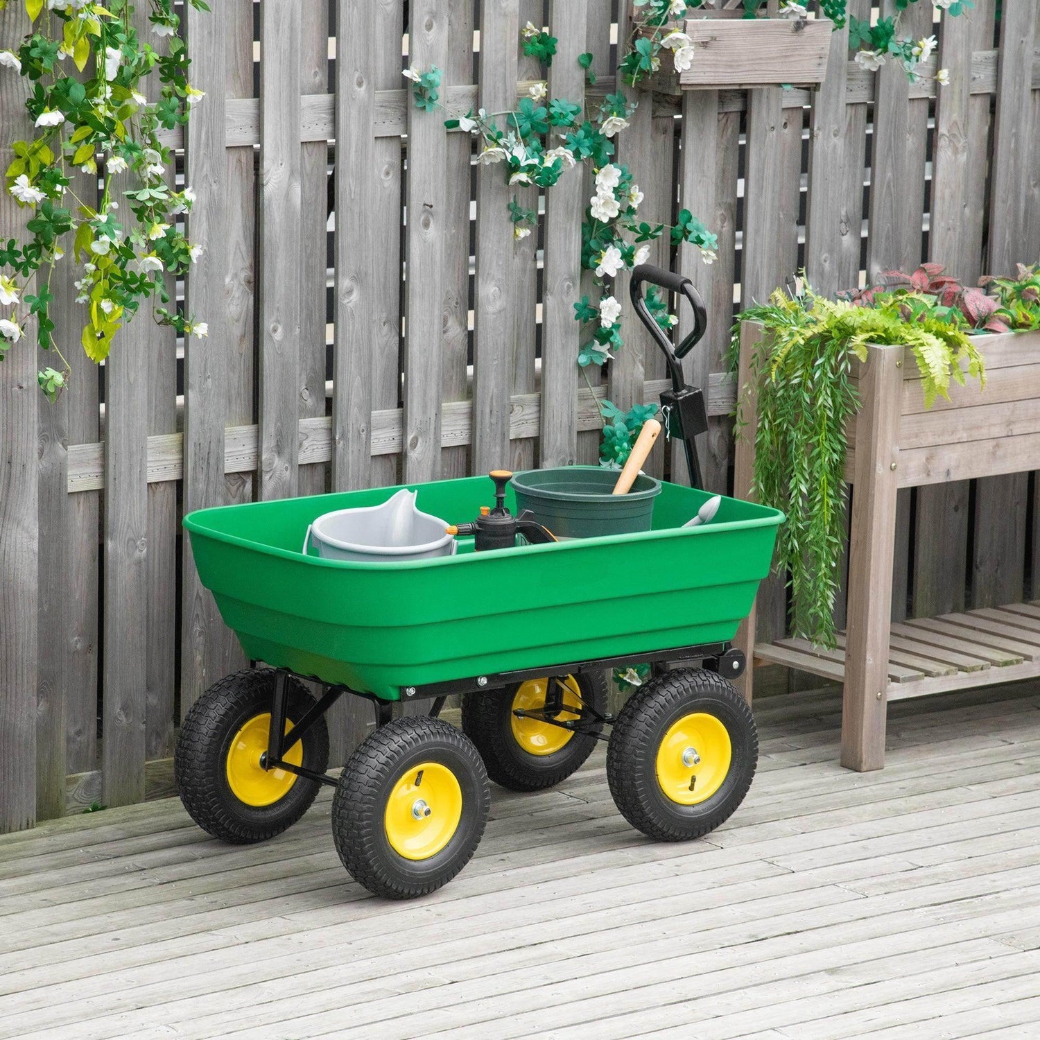 Green heavy duty garden trolley with single basin, four yellow wheels, curved handle.