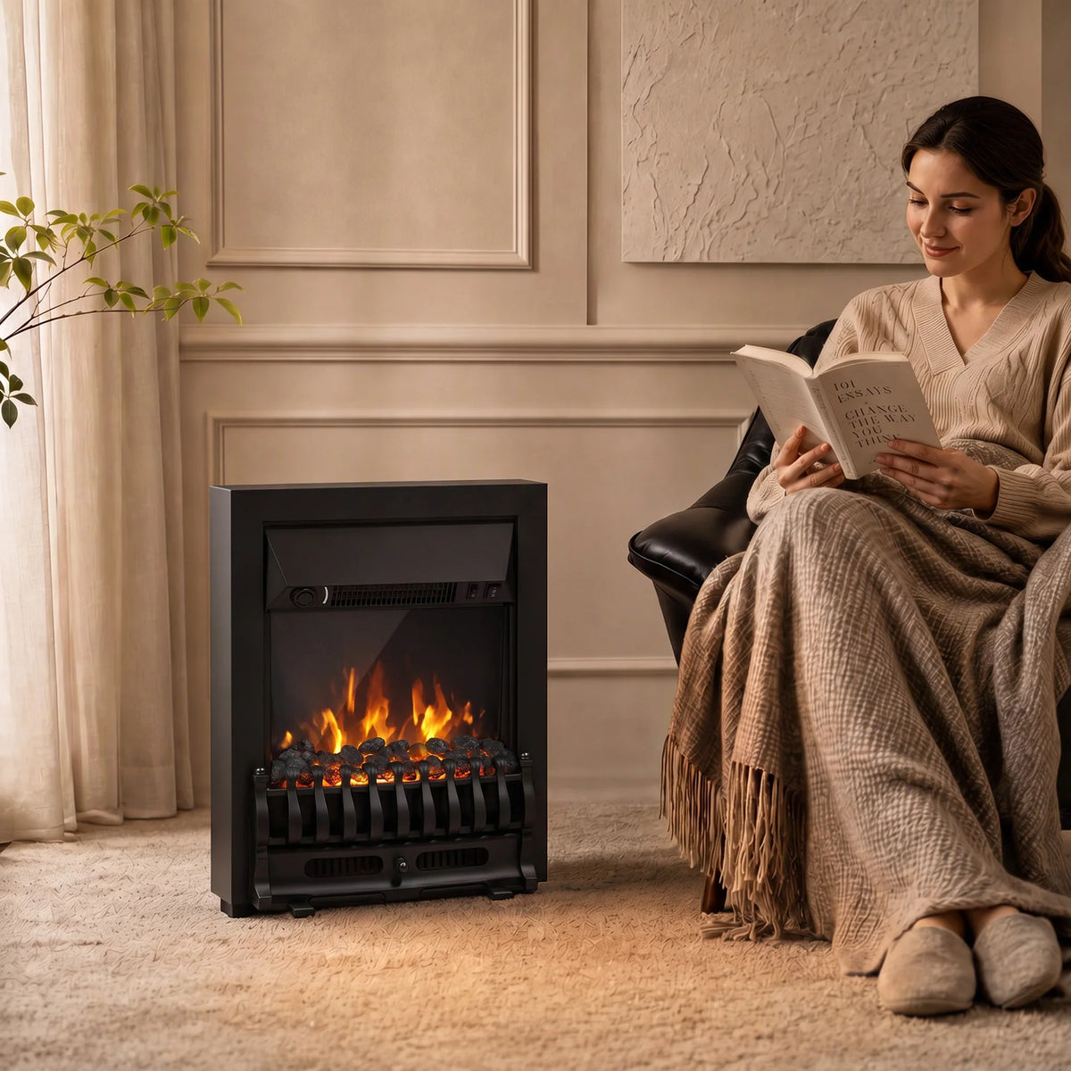 Black freestanding electric fireplace stove with glowing LED flames in a living room