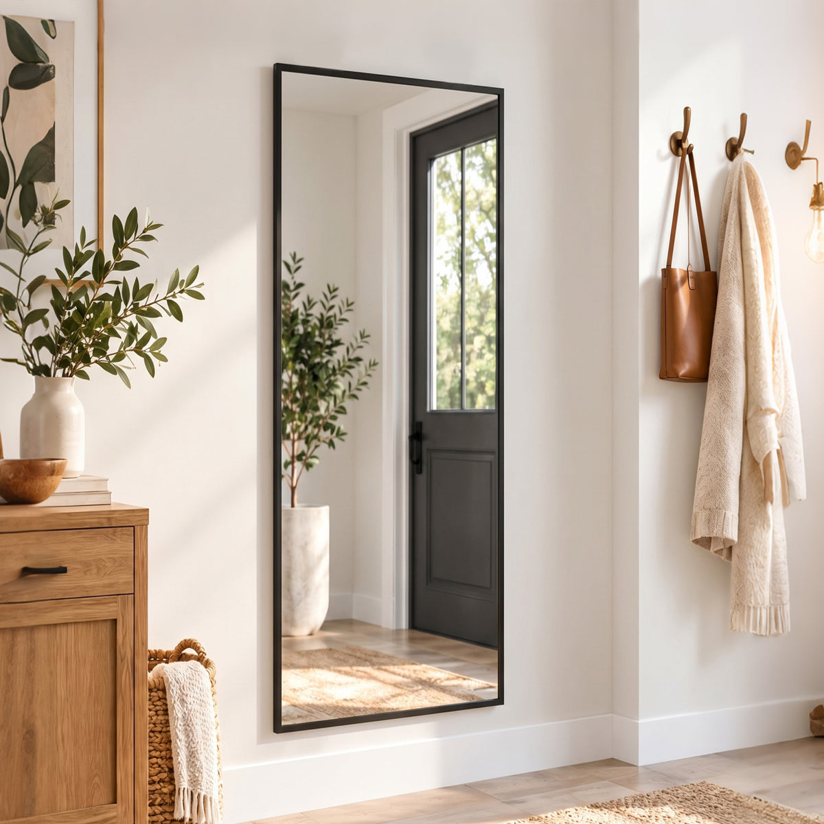 Full-length black wall mirror with adjustable hooks and reflective glass