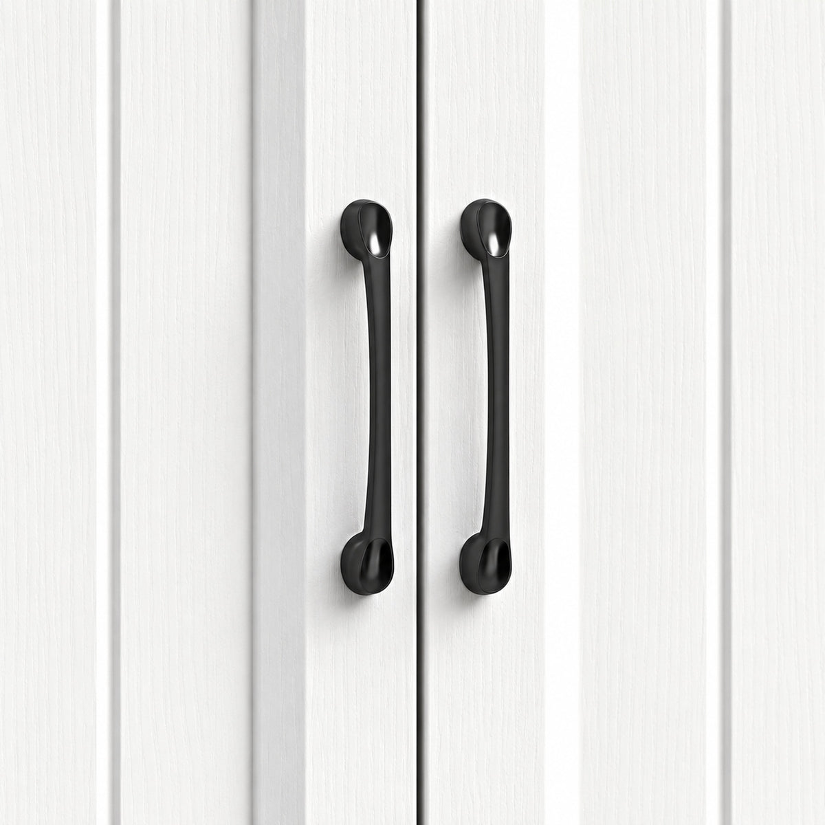 White cabinet doors with black curved bar handles