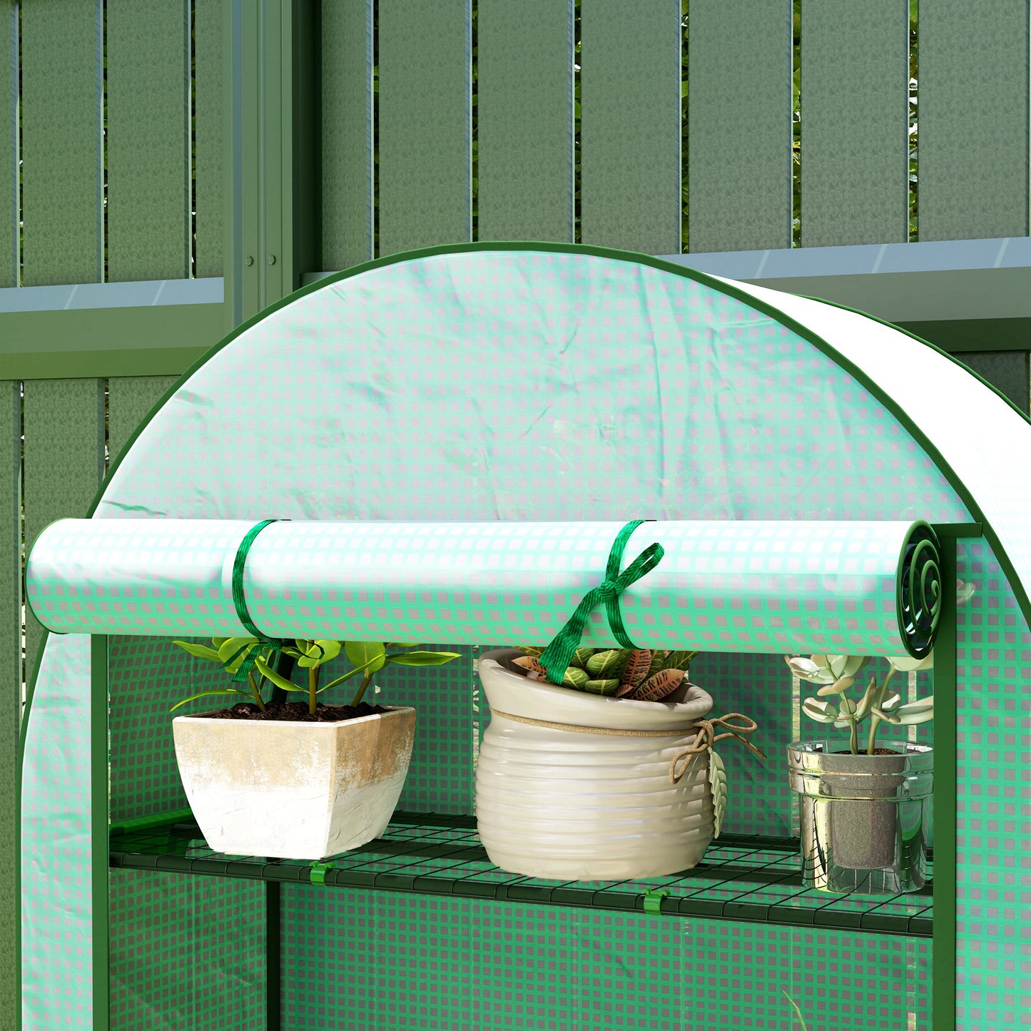 Outsunny Four Shelf Mini Greenhouse in Green with UV Protective Cover and Roll Up Door for Easy Access