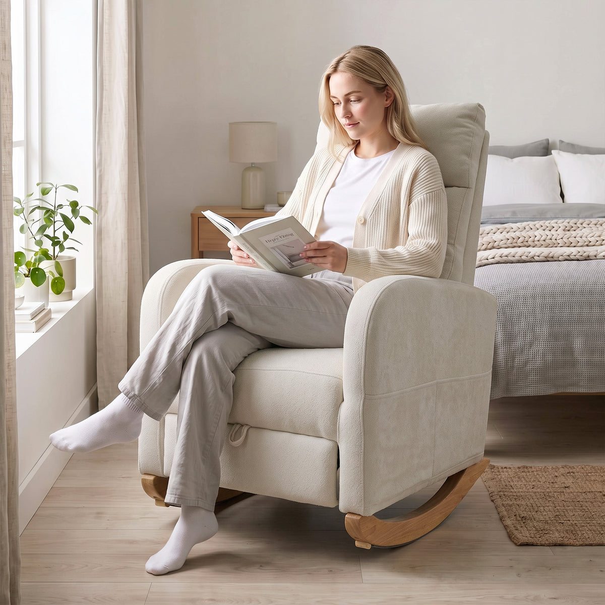 Light beige high-back rocking chair with retractable footrest and padded seat back