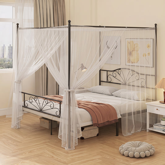 Black metal four-poster bed frame with sheer canopy curtains and ornate scroll headboard.