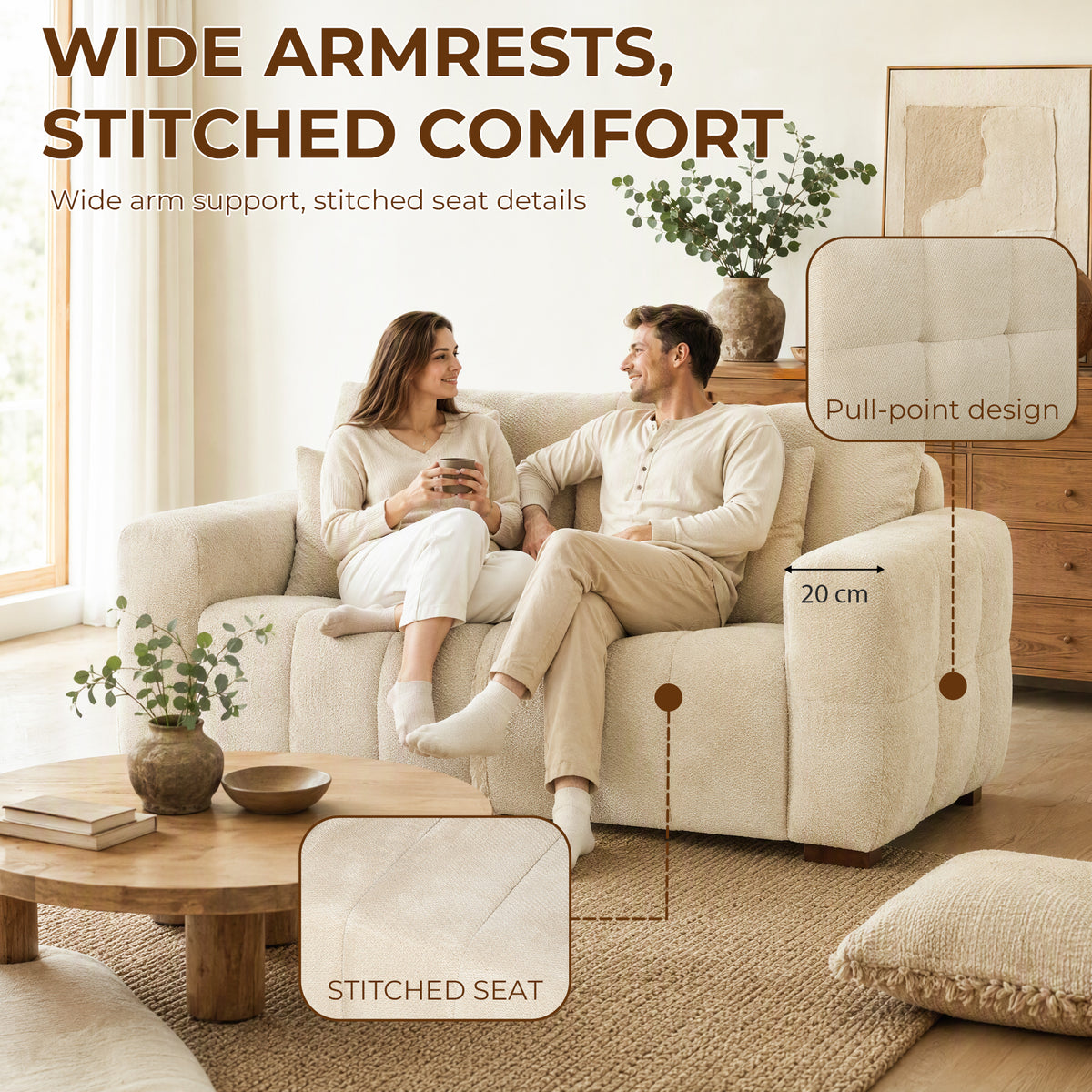 Cream white velvet loveseat with wide armrests and stitched seat detail, two cushions