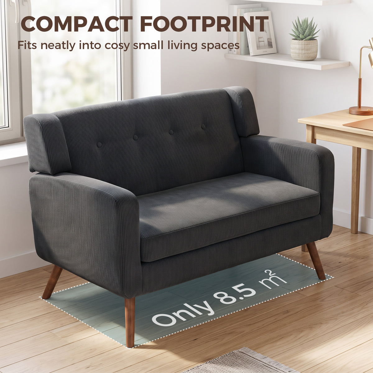 Gray corduroy compact loveseat with tufted back and wooden legs on rug