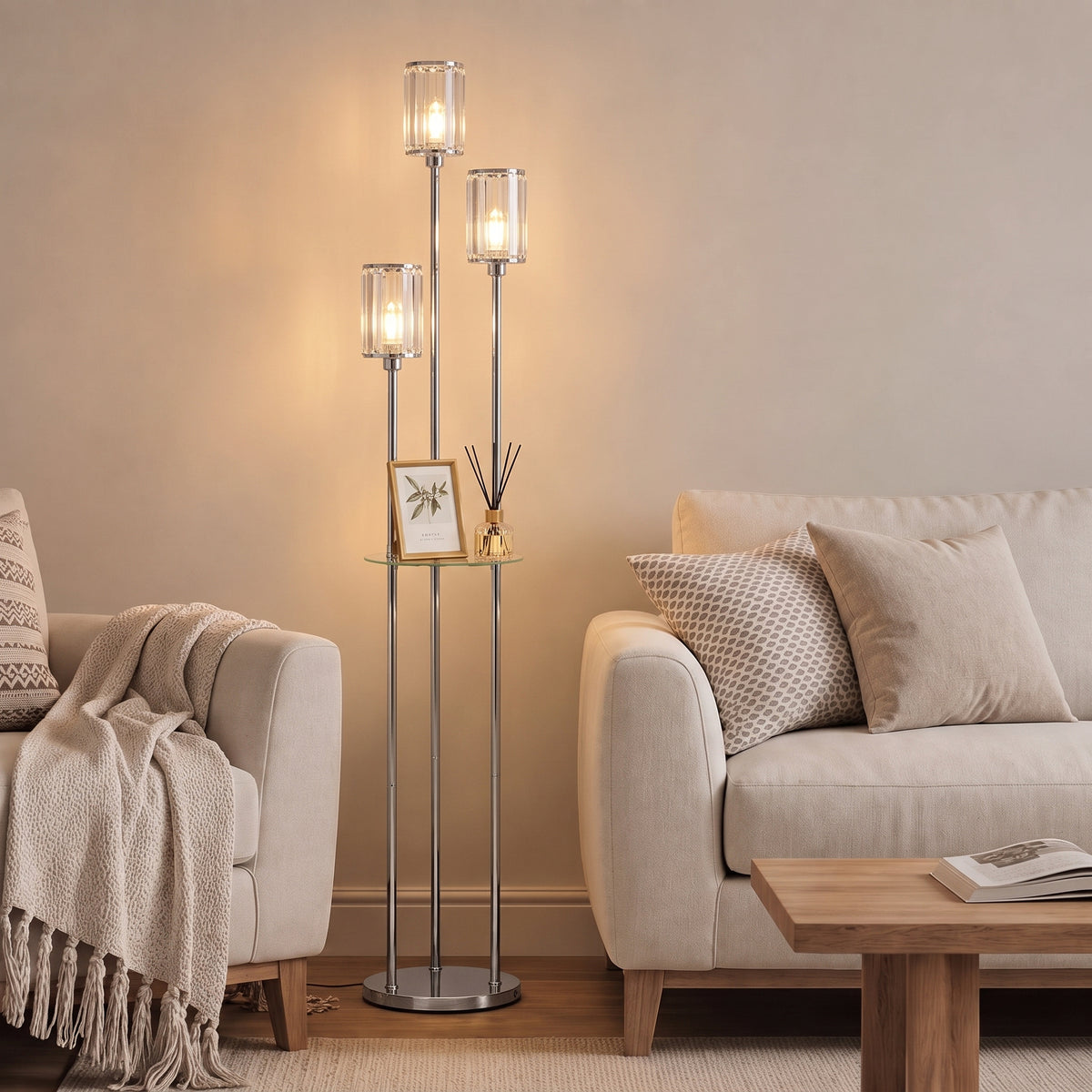 Tall chrome crystal floor lamp with three illuminated glass shades and round base