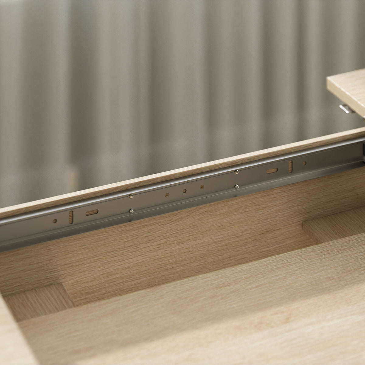 Extendable table extension track and guide rails under the tabletop