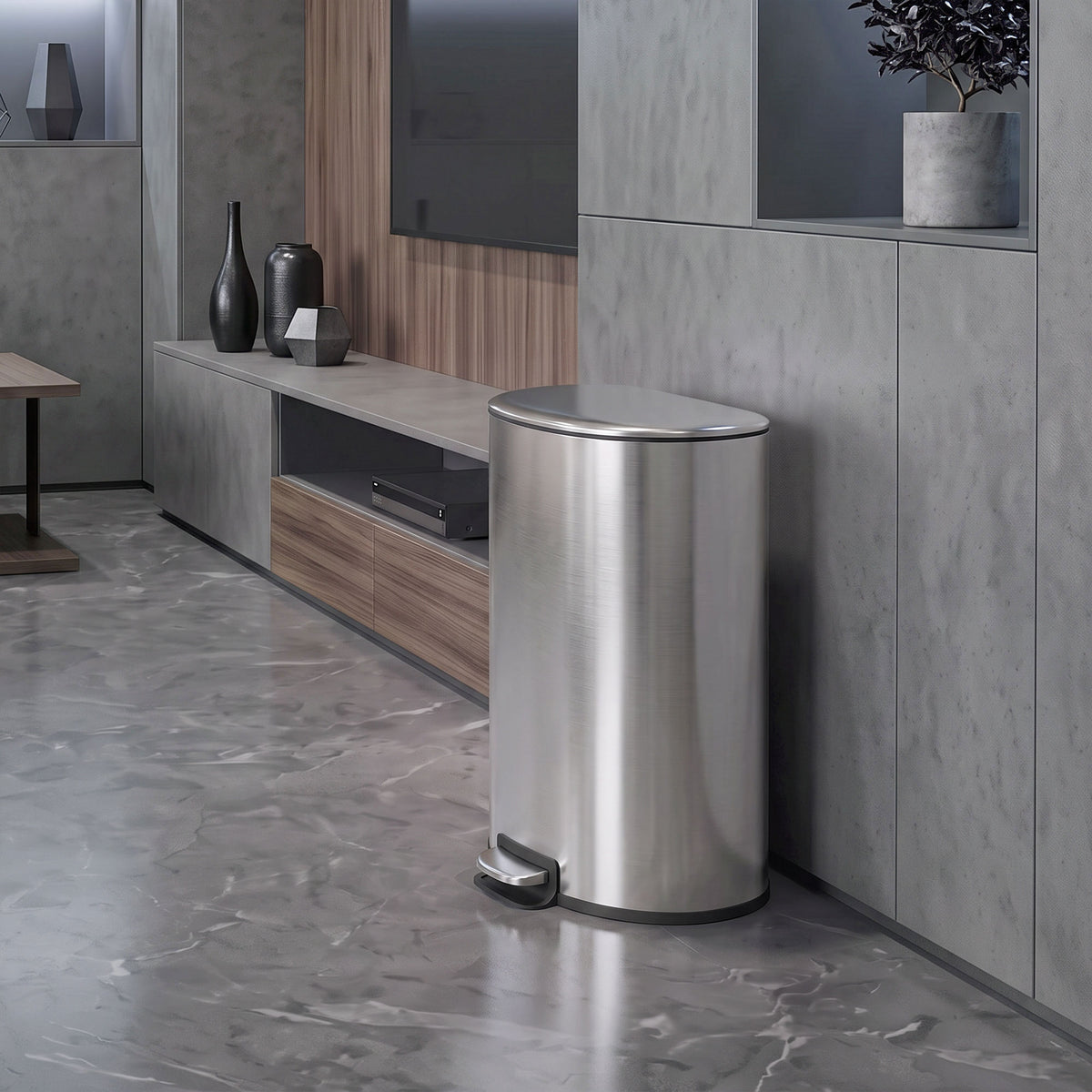 Stainless steel pedal bin with closed lid and rounded shape for kitchen use