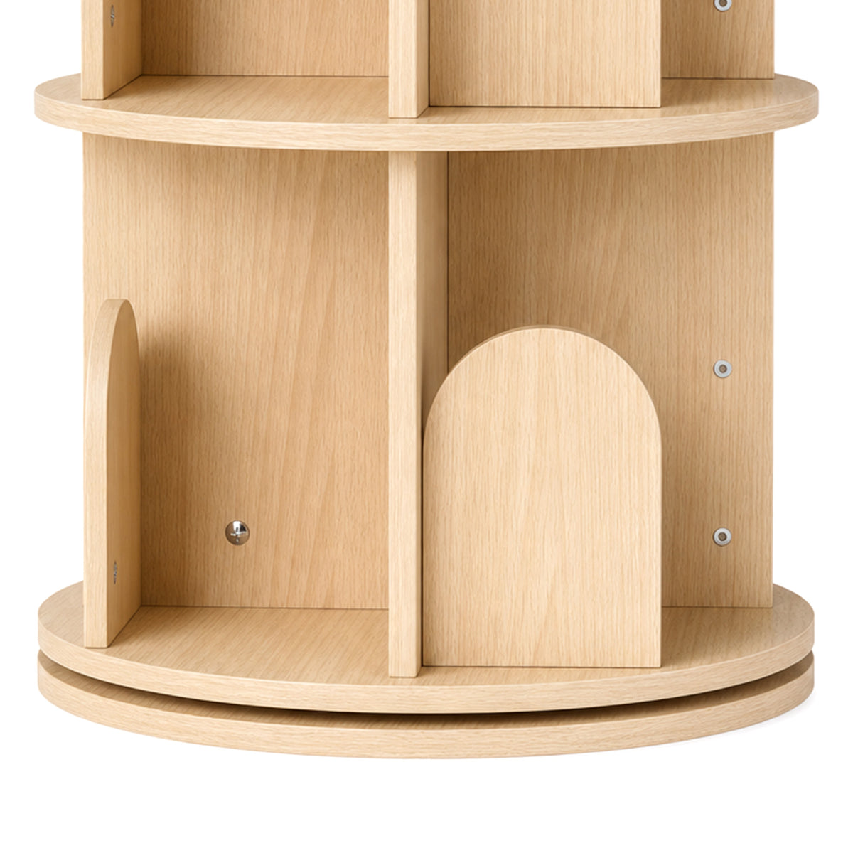Close-up of light wood rotating bookshelf with rounded arch door-shaped divider slots