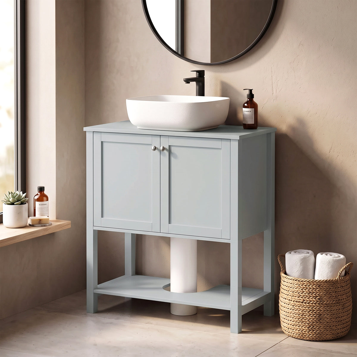 Light blue bathroom vanity cabinet with two doors and open lower shelf